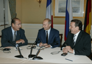 Echange entre Jacques Chirac, Vladimir Poutine et Gerhard Schröder, 24.09.2003 (Copyright MEAE / F. de la Mure)